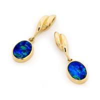 Elegant yet understated, this pair of 14K yellow gold earrings are made with quality doublet opals and the high level of manufacturing standard one would come to expect from Opals Australia.