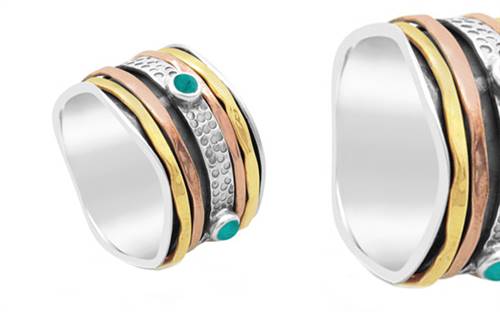 Stones & Silver’s sterling silver wide banded ring