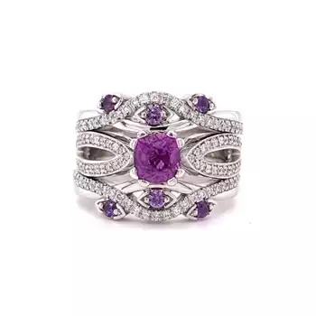 Platinum, diamond & purple sapphire ring by Bevan Jones.