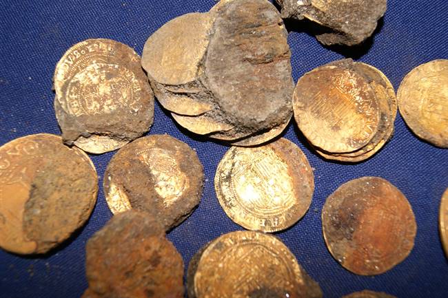33 kilograms of gold coins recovered from BOM Jesus shipwreck near Oranjemund, Namibia. | Source: Shadreck Chirikure