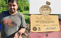 A Minnesota man is the latest tourist to depart the Crater of Diamonds State Park with a special souvenir after stumbling across a large brown diamond. | Source: Daily Mail