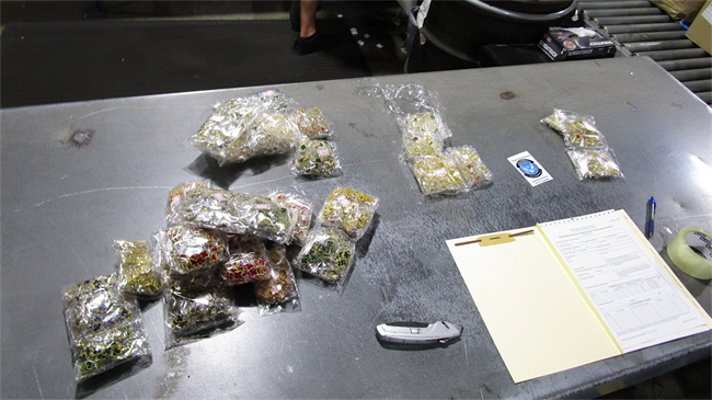 Some of the counterfeit Van Cleef & Arpels “Alhambra” jewellery seized by customs officers.