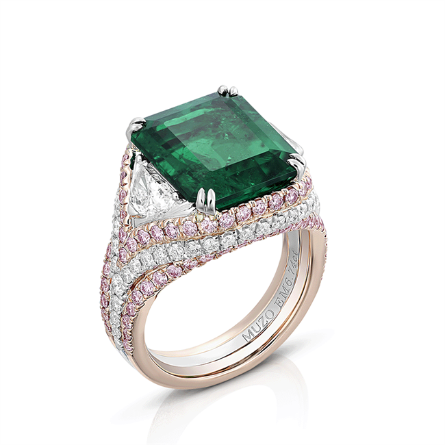 The Hana Ring. Floral, graceful and joyful.  A no oil Muzo emerald 6.74ct with 2 half moon white diamonds weighing 0.76cts in an elegant setting with Argyle pink diamonds and white diamonds. Set in platinum and 18K gold