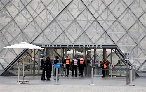 Another two people have been arrested and charged over the stunning jewellery heist at the Louvre Museum in Paris. | Source: REUTERS/Benoit Tessier