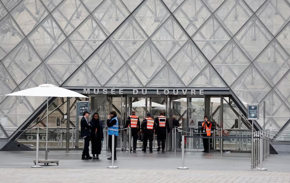 Another two people have been arrested and charged over the stunning jewellery heist at the Louvre Museum in Paris. | Source: REUTERS/Benoit Tessier
