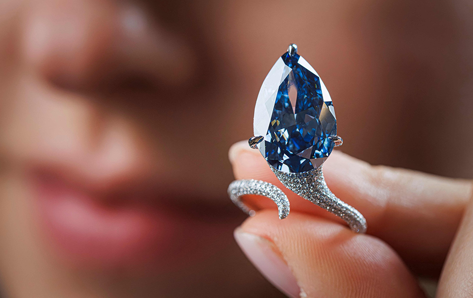 A stunning blue fancy colour diamond was the headline act at a recent Christie’s auction in Geneva, commanding a remarkable return. | Source: Daily Sabah/AFP
