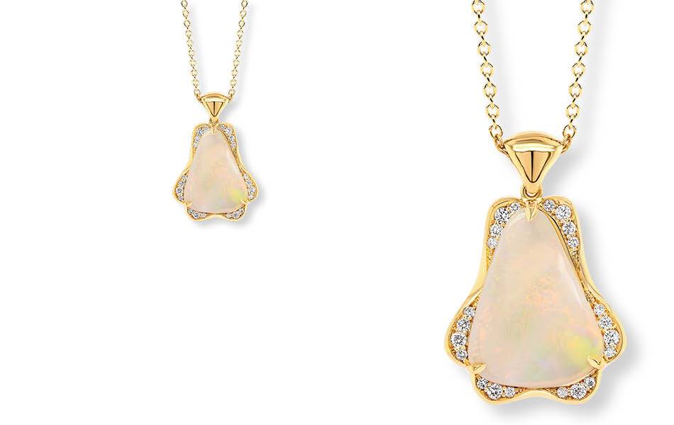 Coober Pedy Opal Pendant: 18K yellow gold pendant featuring a glowing white opal framed by brilliant-cut diamonds. A refined and timeless design celebrating Australian beauty. | Source: Ellendale Diamonds