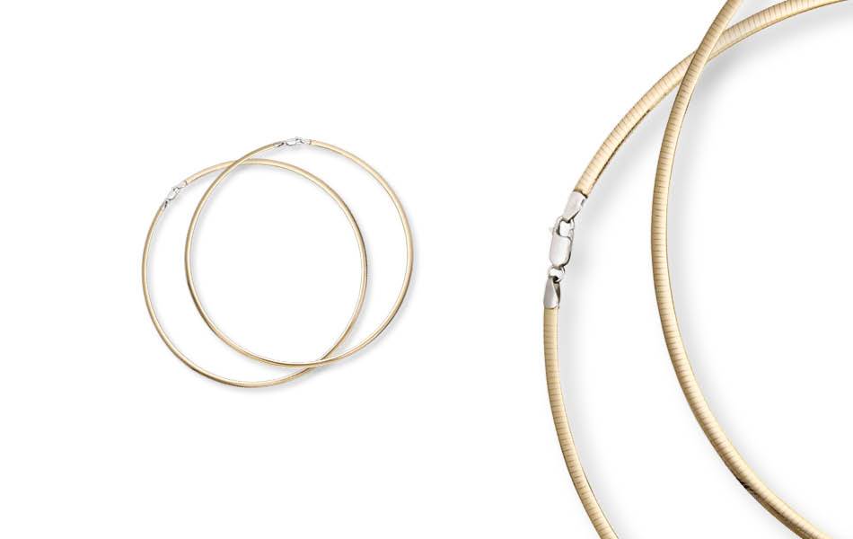 Athan's Omega Necklaces: Crafted in Italy in 9ct, 14ct & 18ct gold (yellow, white, two-tone). Refined brilliance & bold, sculptural presence. Contemporary luxury. | Source: Athan Wholesale Jewellers