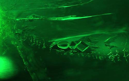 These are inclusions buried within emerald. Em­erald is a member of the beryl family, its chemical composition being beryllium aluminium silicate.