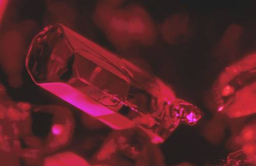 Ruby is defined as crystalline aluminium oxide, called corundum, with traces of the chemical element chromium,  which is responsible for  its red colour.