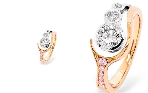 Ellendale Diamonds: Contemporary 18K white & rose gold ring with Argyle pink & white diamonds. Fluid, modern design balances soft blush tones with bright sparkle. | Source: Ellendale Diamonds