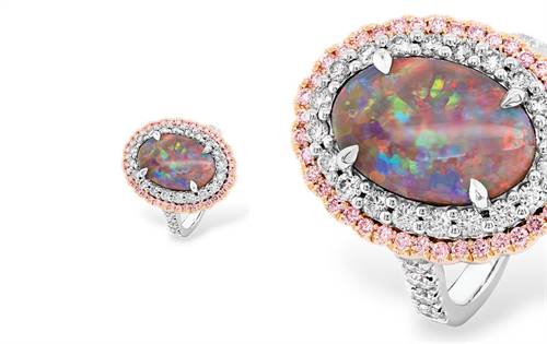 Discover Ellendale Diamonds' exquisite opal ring. Featuring rare Argyle pink diamonds and white diamonds in 18K white and rose gold. A luxurious statement piece. | Source: Ellendale Diamonds Australia