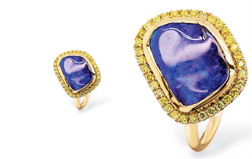 Ellendale Diamonds: Make a statement with this 18K yellow gold ring. A freeform opal is haloed by vibrant yellow diamonds. Bold, individual, and eye-catching. | Source: Ellendale Diamonds Australia