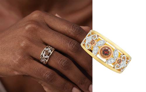Wild Daisy Ring: Nature-inspired design in 9ct yellow, white & rose gold. Features a 0.30ct Australian Chocolate Diamond, white diamond petals & yellow gold rails. | Source: Bolton Gems