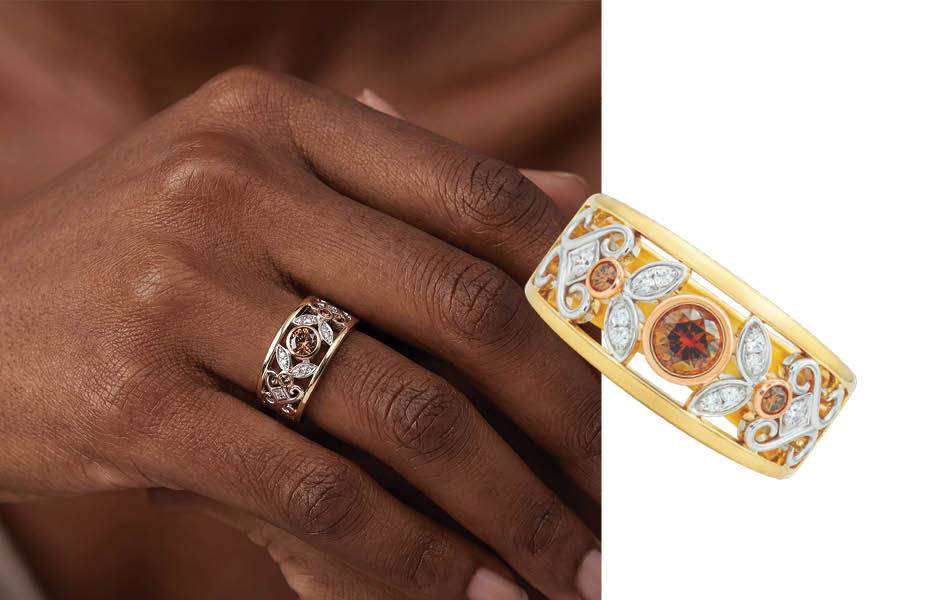 Wild Daisy Ring: Nature-inspired design in 9ct yellow, white & rose gold. Features a 0.30ct Australian Chocolate Diamond, white diamond petals & yellow gold rails. | Source: Bolton Gems