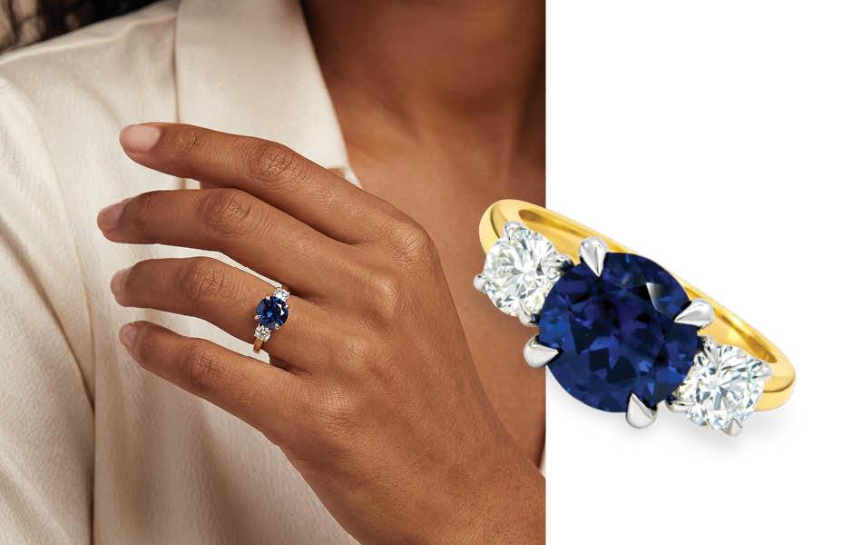 Bolton Gems: An 18k yellow/white gold trilogy ring featuring a 2.42ct Inverell Sapphire, flanked by 0.62ct diamonds, polished band. | Source: Bolton Gems