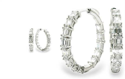 18ct white gold hoops with channel-set emerald-cut diamonds for maximum fire. Timeless, modern, and versatile elegance.