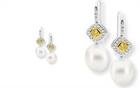 18ct white & yellow gold, featuring yellow diamonds framed by white diamonds. Luminous Australian South Sea pearls. Vibrant colour & classic sophistication.