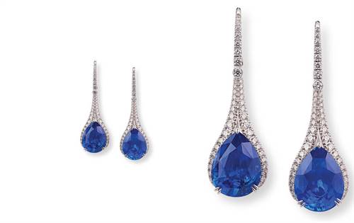 18ct gold drop earrings with pear-shaped, Gübelin-certified, no-heat blue sapphires (9.00 & 8.90ct). Framed by 1.26ct diamonds. Elegant design.