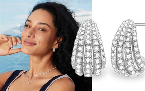 Dazzling dome paved with brilliant cubic zirconia. Seamless, comfortable fit with bold, refined radiance. Shine on your own terms, day or night.