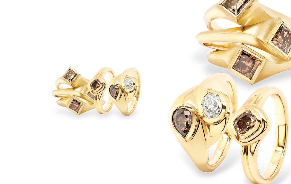 9ct yellow gold rings featuring emerald, marquise, pear & princess-cut champagne diamonds in bold, sculptural & geometric settings. Elegant & unique. | Source: Ellendale Diamonds