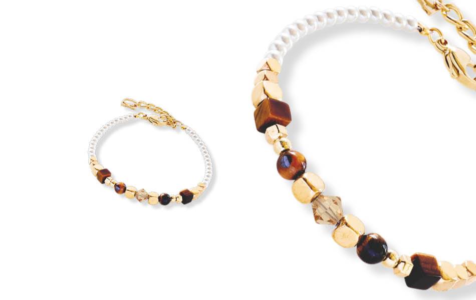 Discover the mini GeoCUBE featuring on-trend teal & semi-precious stones. Plus, the Radiating Pearl Necklace with tiger's eye. Timeless elegance with contemporary flair. | Source: Coeur de Lion - Timesupply