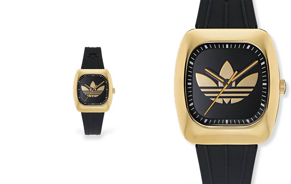 Vintage soul, modern influence. 37mm gold-tone case, trefoil logo & sporty black silicone strap. Celebrate icons, past & future. | Souce: Adidas Originals - Designa Accessories