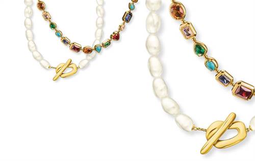 Modern, nature-inspired pearl necklaces with organic clasps. Elyndra chain: gold-plated silver with garnet, emerald & more, celebrating femininity & symbolism. | Source: Thomas Sabo