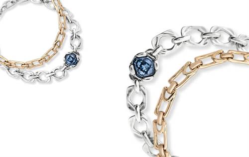 Handmade in Spain. 18ct gold-plated rectangular links & sterling silver with blue crystal. Bold, geometric designs built for creativity & confidence. | Source: UNOde50