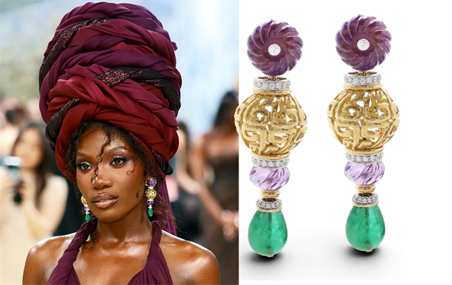 Doechii attends the 2026 Met Gala in New York, wearing David Webb’s Sky Lantern Earrings with emerald drops, fluted amethyst beads and brilliant-cut diamonds set in 18K gold and platinum. | Source: Only Natural Diamonds/David Webb