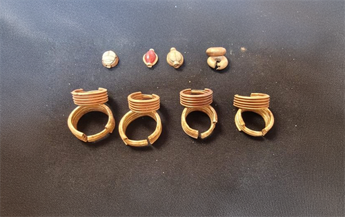 Archaeologists have uncovered a rare, nearly complete funerary assemblage, including jewellery, at the Panhesy necropolis in Cairo, offering new insight into ancient Heliopolis burial practices. | Source: Egypt Today