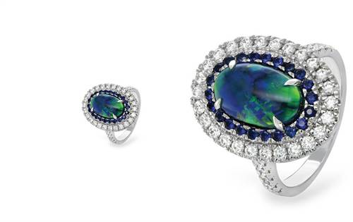 18ct white gold, 3.17ct black opal, halo of blue sapphires and white diamonds — rare and elegant. | Source: Sapphire Dreams