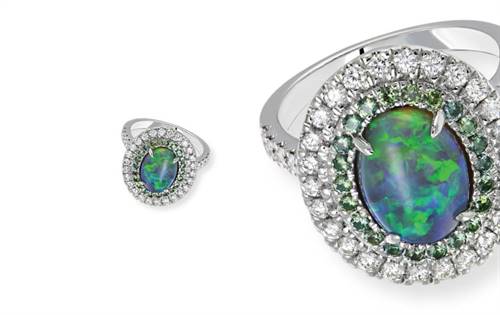 18ct white gold, 2.45ct black opal, halo of Australian teal sapphires and white diamonds — striking and luminous. | Source: Sapphire Dreams