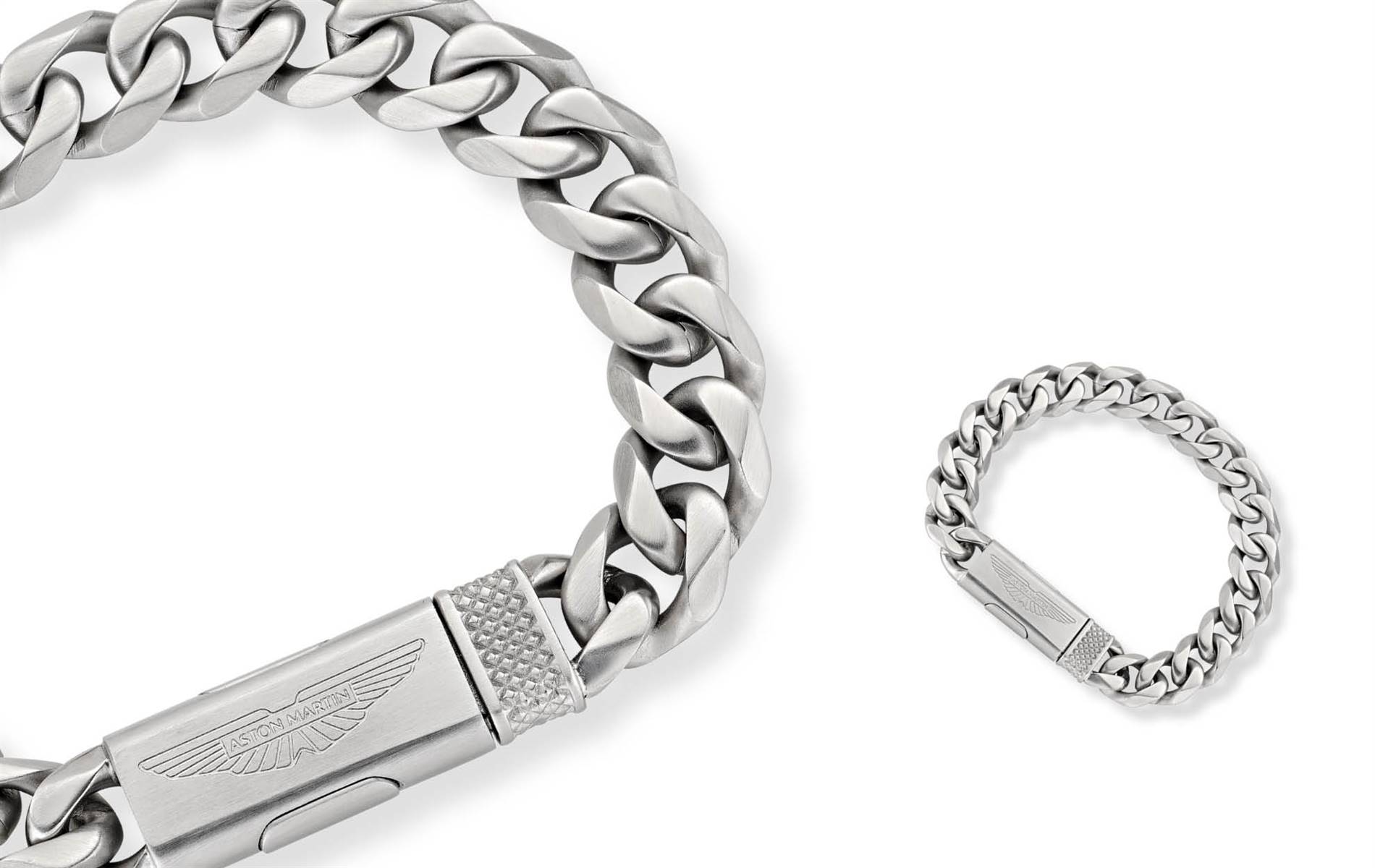 Precision-crafted links, wing-engraved clasp, reversible logo — bold, refined and distinctly styled. | Source: Aston Martin