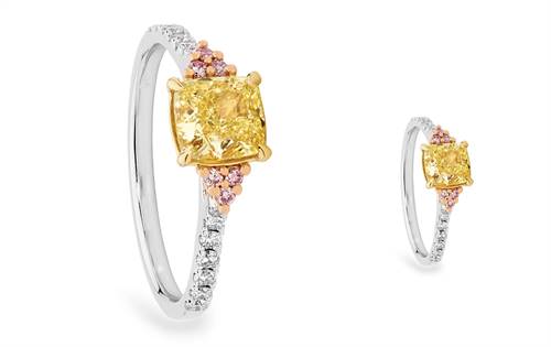 Tri-gold ring featuring cushion-cut Argyle yellow diamond with pink and white diamond accents. | Souce: Ellendale Diamonds