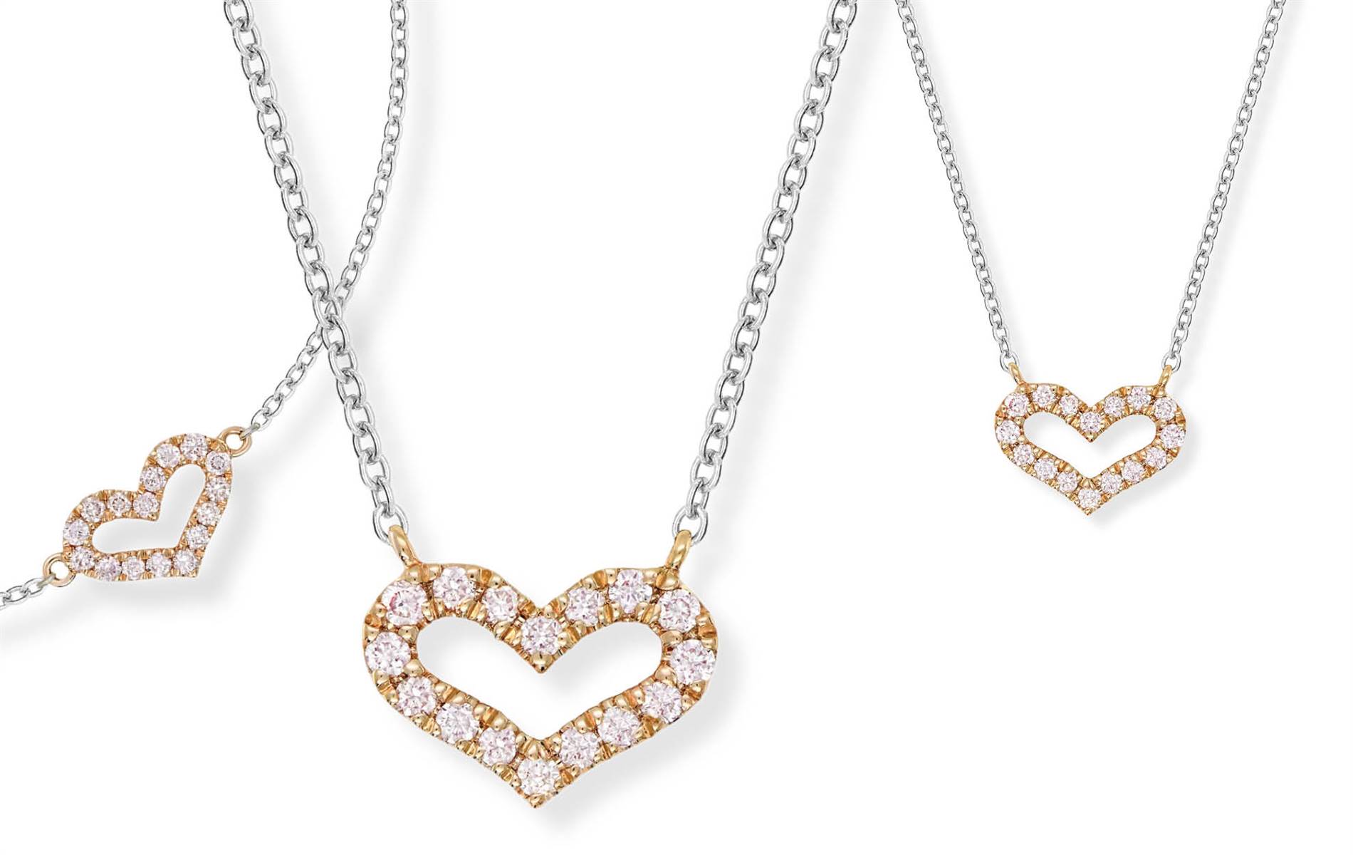 18ct gold with rare Australian Argyle pink diamonds — elegant heart-shaped designs. | Source: Pink Kimberley