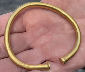 3,000-year-old gold bracelet found in a field in Llanuwchllyn.