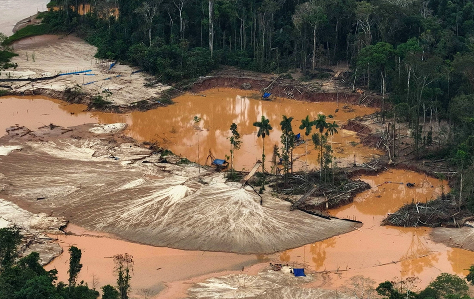 Rising gold prices are driving a surge in illegal mining across Peru, putting protected rainforest under greater pressure while strengthening organised crime networks behind the illicit trade. | Source: The Japan Times/Bloomberg