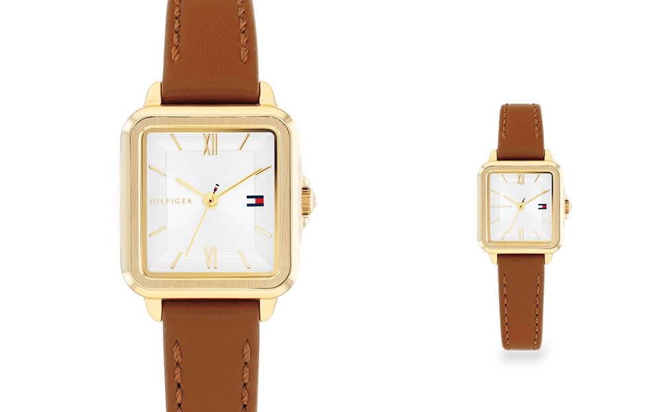Silver-white dial, tan leather strap — soft neutral tones, understated yet distinctive everyday style. | Source: Tommy Hilfiger