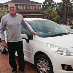 Lucky jeweller Darryl Tighe wins a car