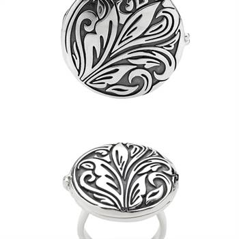 This matching pendant and locket ring are new from Pastiche's Empress collection 