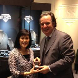 Sandra Fong receives her prize, the elegant 'Sun Struck diamond ring from Robert Musson, owner of Musson Jewellers