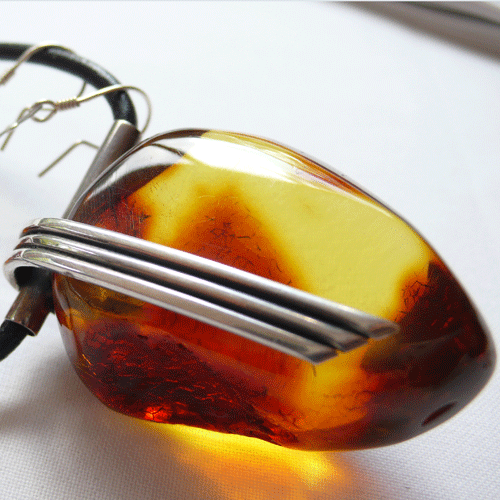 Olga Karolina's cognac amber and sterling silver pendant